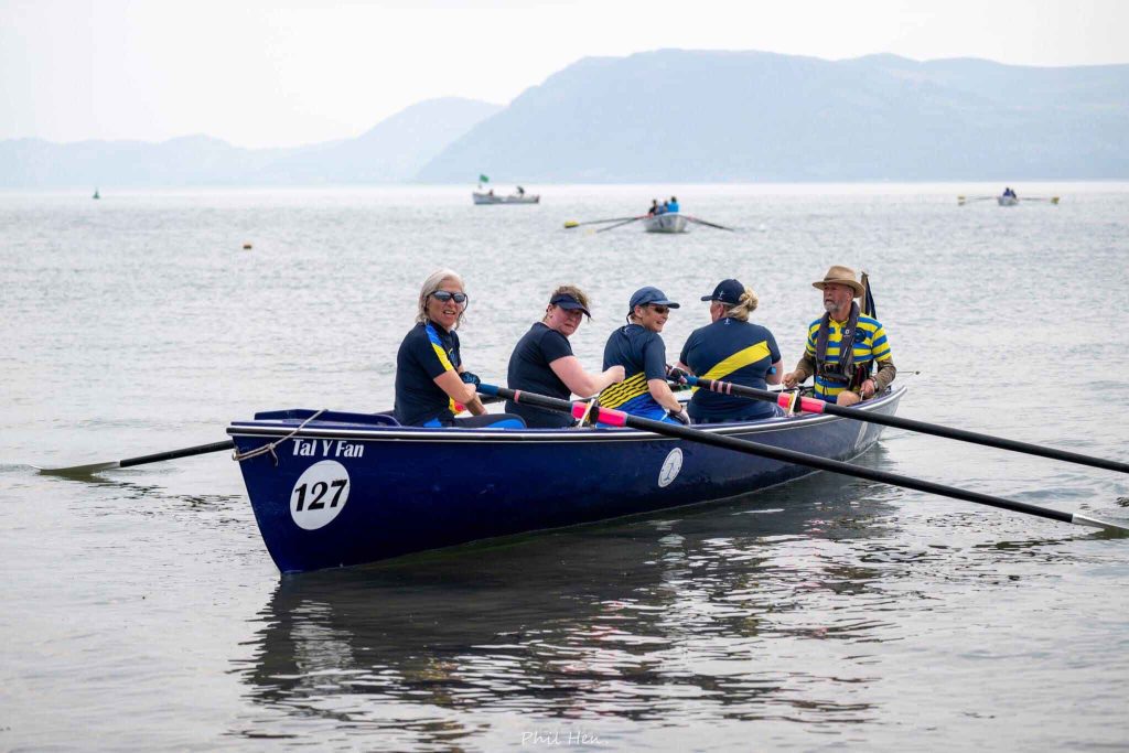 Conway rowers aboard Tal Y Fan in the the Menai Straits